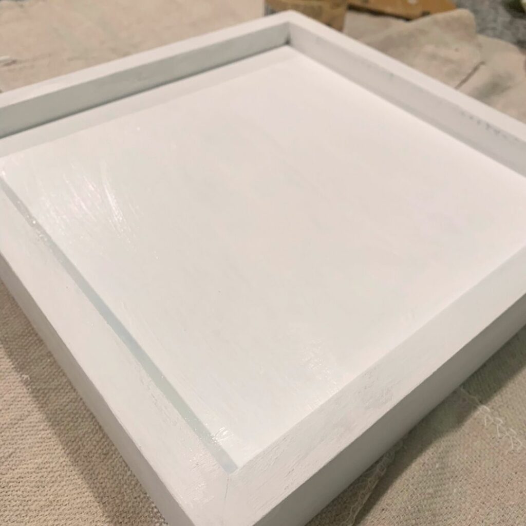 Used wall decor painted white